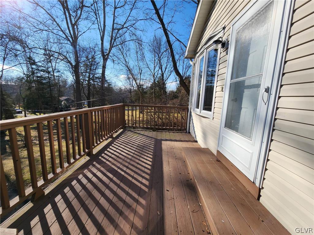 4824 Cedar Grove Road Bangor, PA 18013 - Photo 4 of 46 a view of balcony with wooden floor and fence