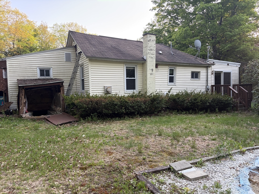 11 South Chesterfield Road Goshen, MA 01096 - Photo 27 of 30 a view of a house with a yard and plants