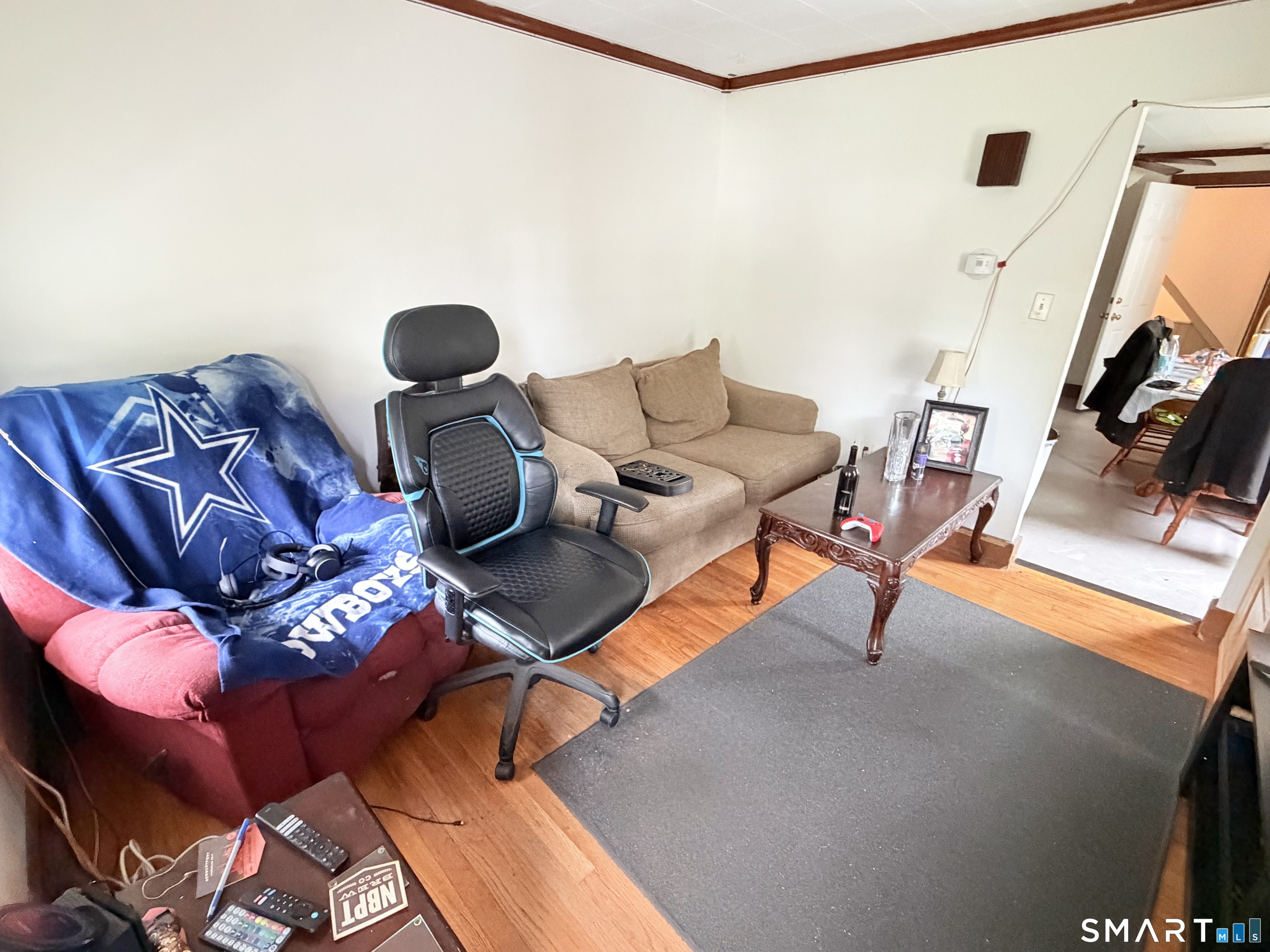 67 Pine Street Meriden, CT 06451 - Photo 14 of 34 a living room with furniture and a flat screen tv