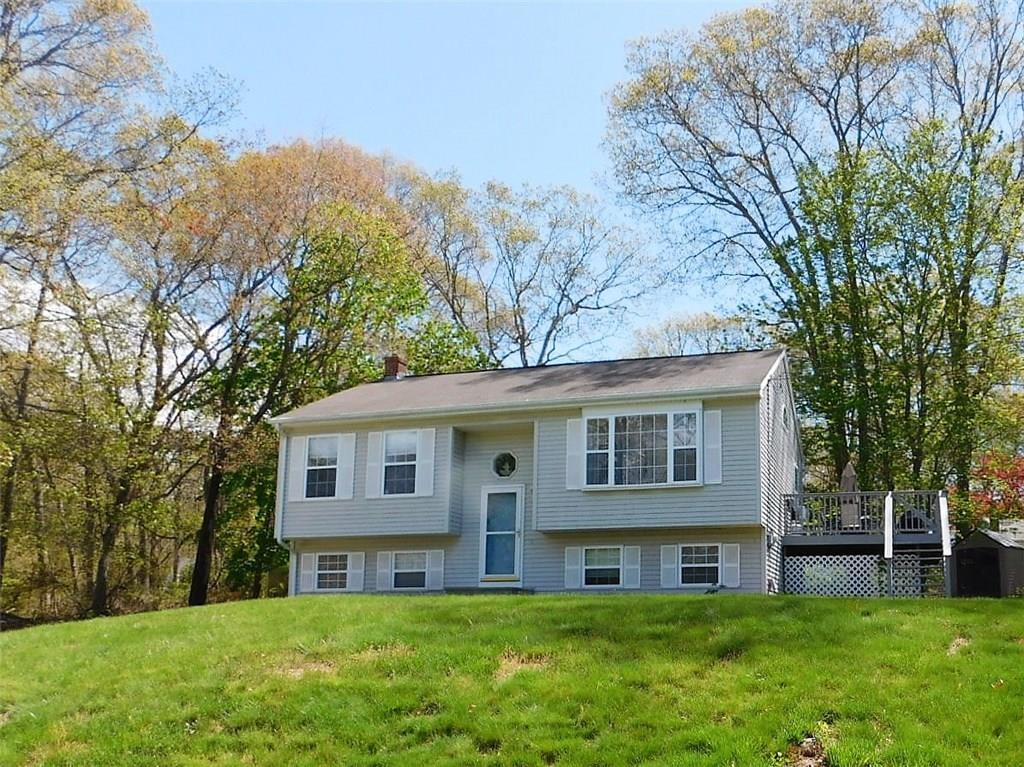 109 Bayview Road East Lyme, CT 06357 - Photo 1 of 1 a view of a house with a yard and sitting area