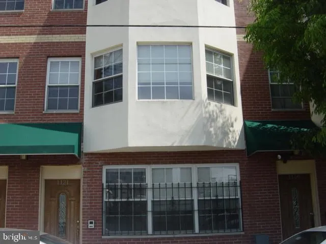 a front view of a house with windows