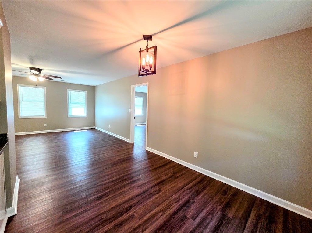 509 Elrod Road Piedmont, SC 29673 - Photo 6 of 28 Warm wood-toned flooring and contemporary lighting create an inviting atmosphere for daily living.