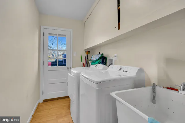 a utility room with washer and dryer