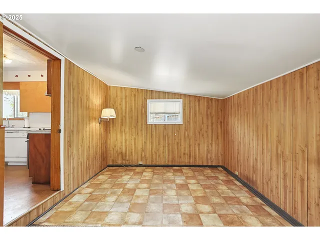 a bathroom with a sink a mirror and a shower