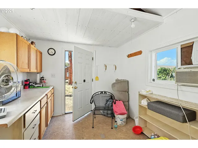 a view of a yard with trees