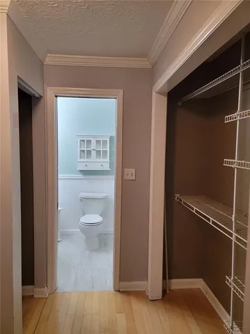 a view of a bathroom with a toilet