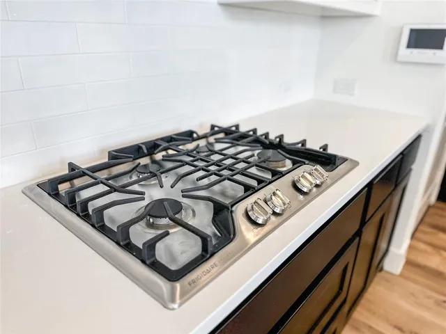 a white bath tub sitting in a bathroom