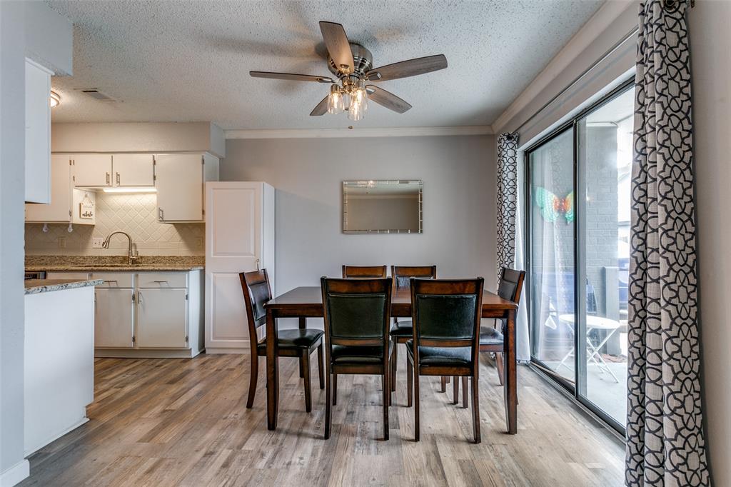 649 Timberline Drive Hurst, TX 76053 - Photo 12 of 29 a view of a dining room with furniture and a window