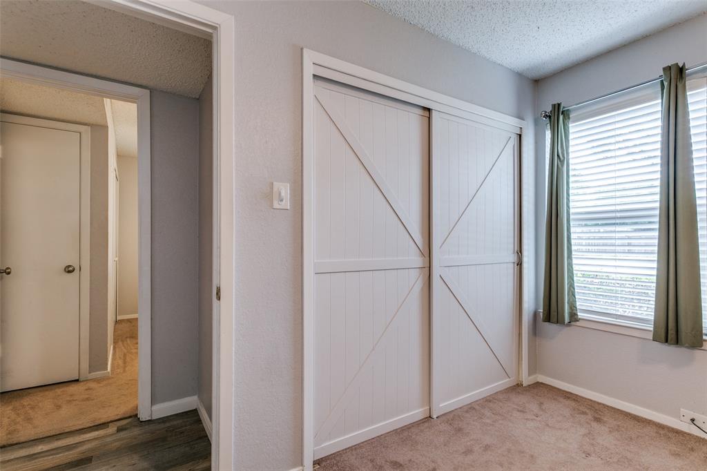 649 Timberline Drive Hurst, TX 76053 - Photo 25 of 29 a view of entryway with wooden floor