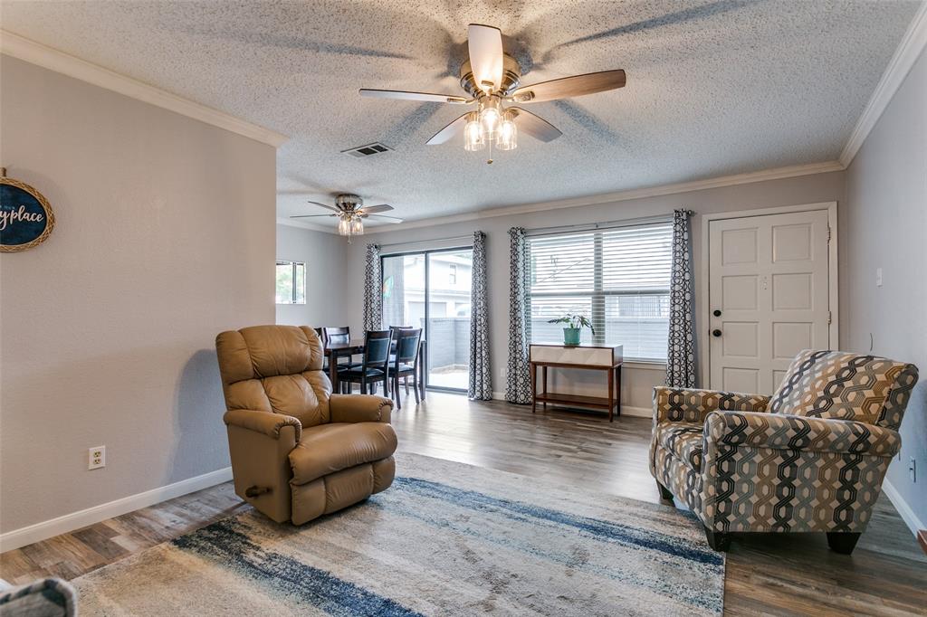 649 Timberline Drive Hurst, TX 76053 - Photo 7 of 29 a living room with furniture and a large window