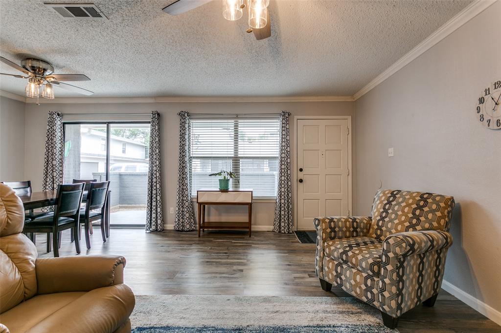 649 Timberline Drive Hurst, TX 76053 - Photo 8 of 29 a living room with furniture and a large window