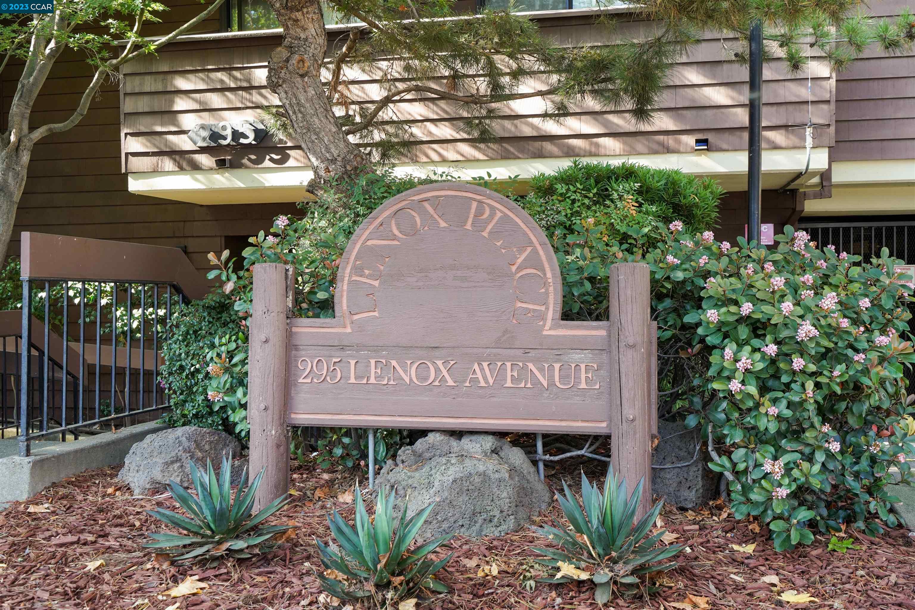 295 Lenox Avenue, Unit 106 Oakland, CA 94610 - Photo 1 of 34 a sign on the side of a building