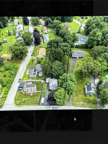 a view of house with a garden