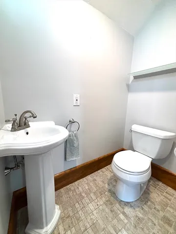 a bathroom with a sink and a toilet