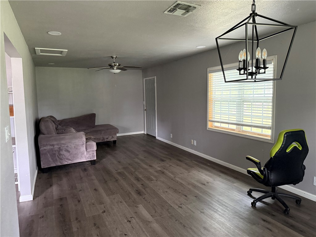 9047 County Road 471 Mathis, TX 78368 - Photo 11 of 21 a view of a workspace with furniture and a window