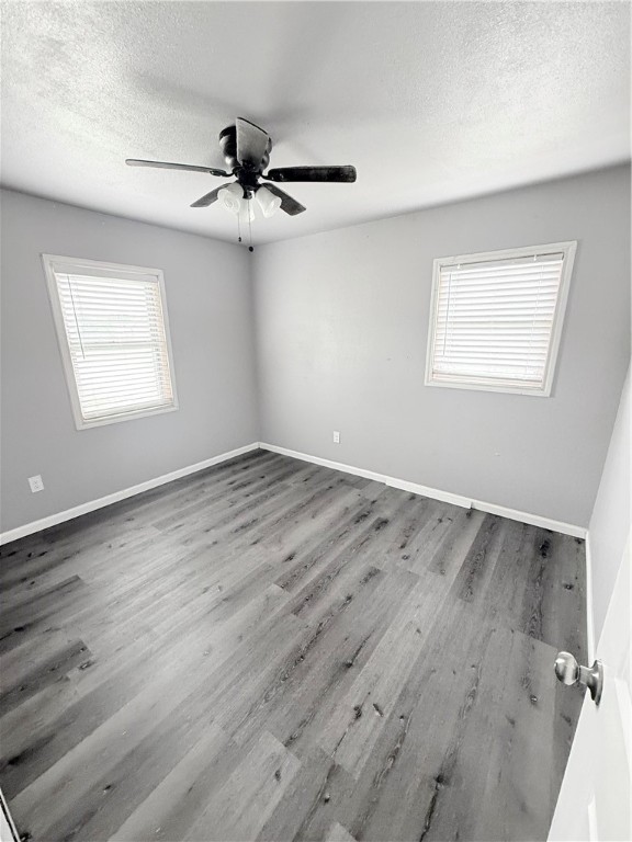 9047 County Road 471 Mathis, TX 78368 - Photo 17 of 21 wooden floor in an empty room with a window
