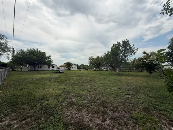 a view of outdoor space with green field