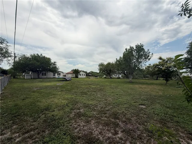 a view of outdoor space with green field