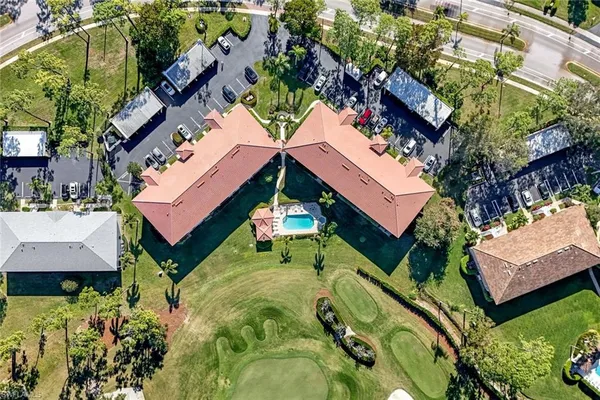 an aerial view of a house with a garden