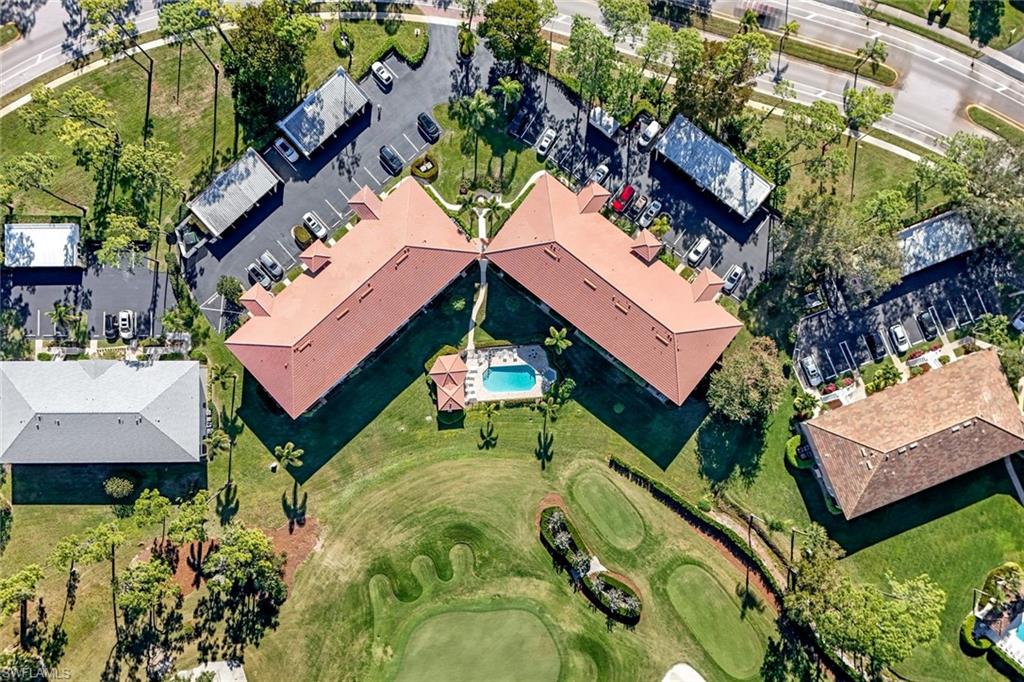 601 Augusta Boulevard, Unit 6014 Naples, FL 34113 - Photo 25 of 31 an aerial view of a house with a garden