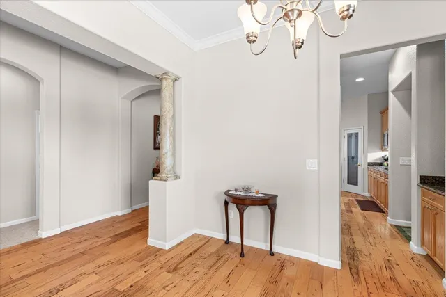 a kitchen with a refrigerator and countertop