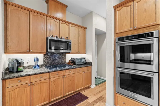 a view of a livingroom with furniture and a window