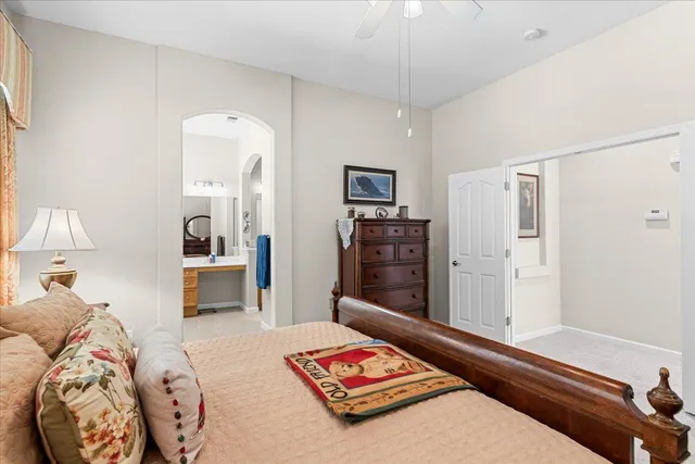 a bathroom with a sink vanity granite and a mirror