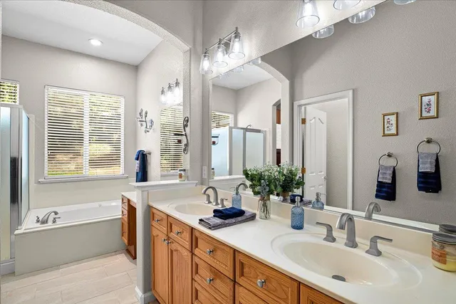 a view of a hallway to a livingroom and furniture