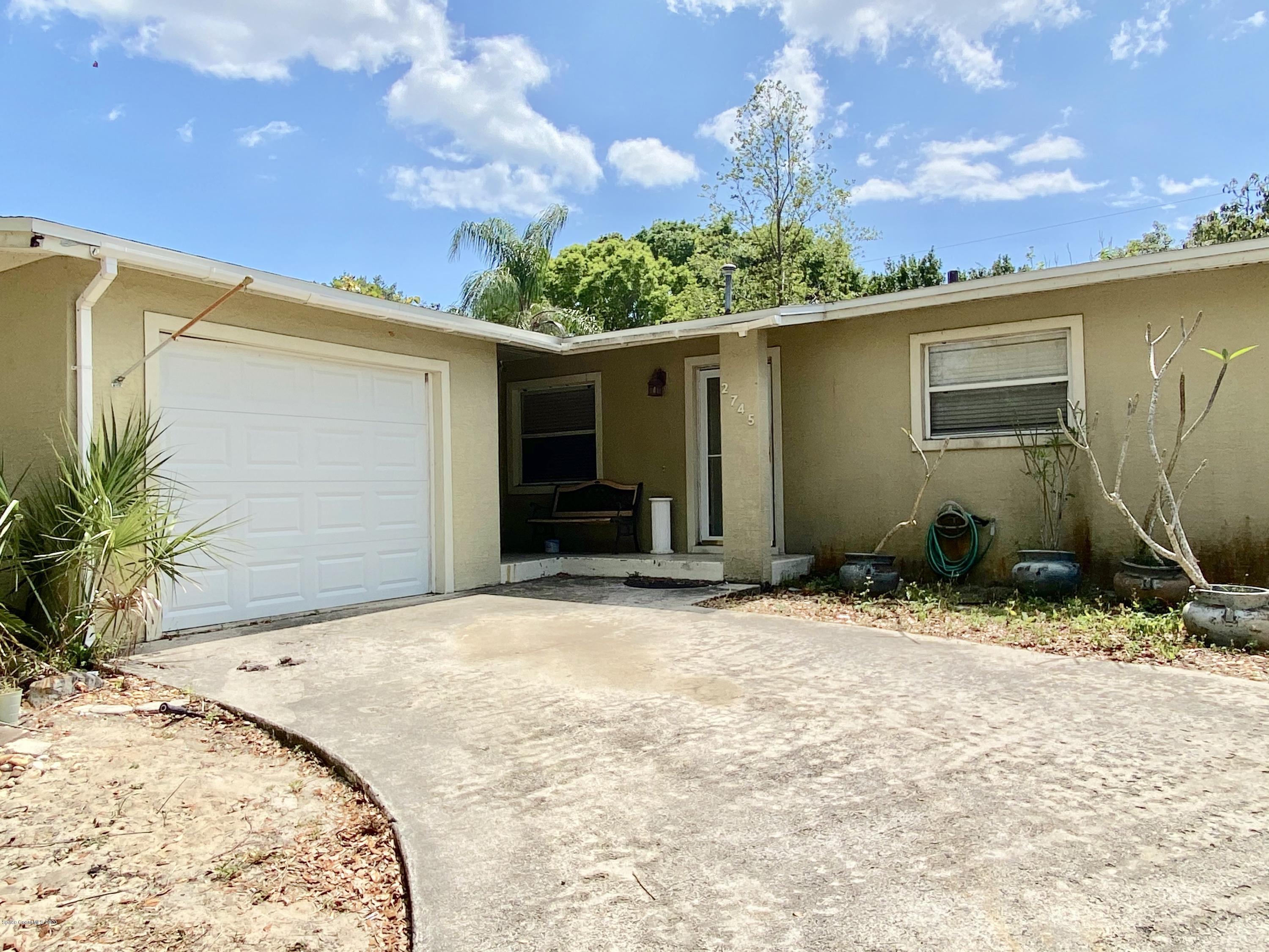 2745 Cherbourg Road Cocoa, FL 32926 - Photo 2 of 35 fullsizeoutput_2446