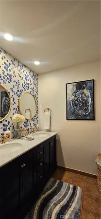 a white toilet sitting next to a bath tub and shower