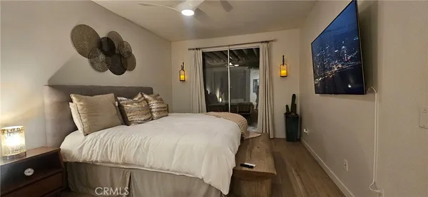 view of living room with furniture and a gate
