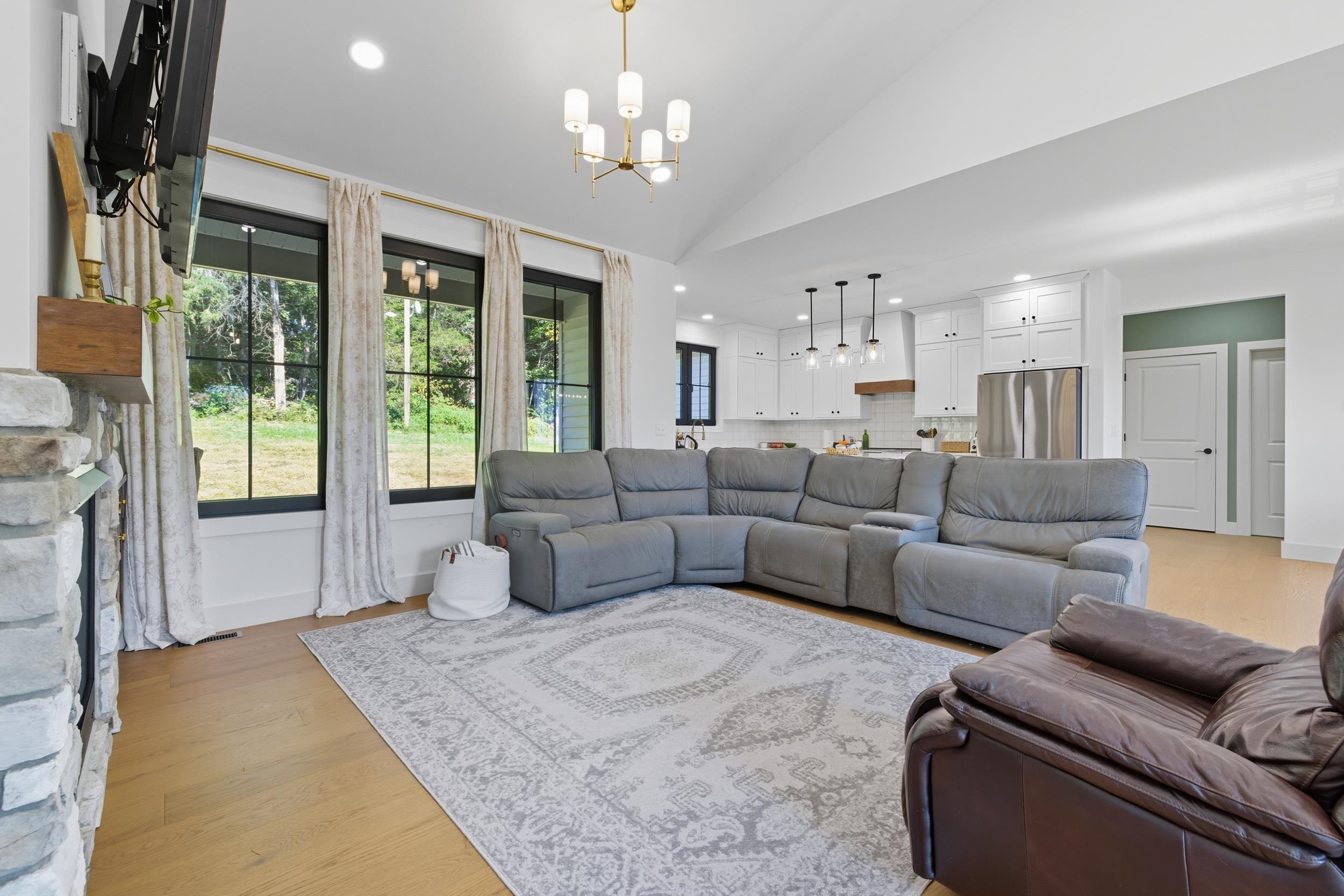2430 Fadley Road Bridgewater, VA 22812 - Photo 25 of 66 a living room with furniture and a chandelier