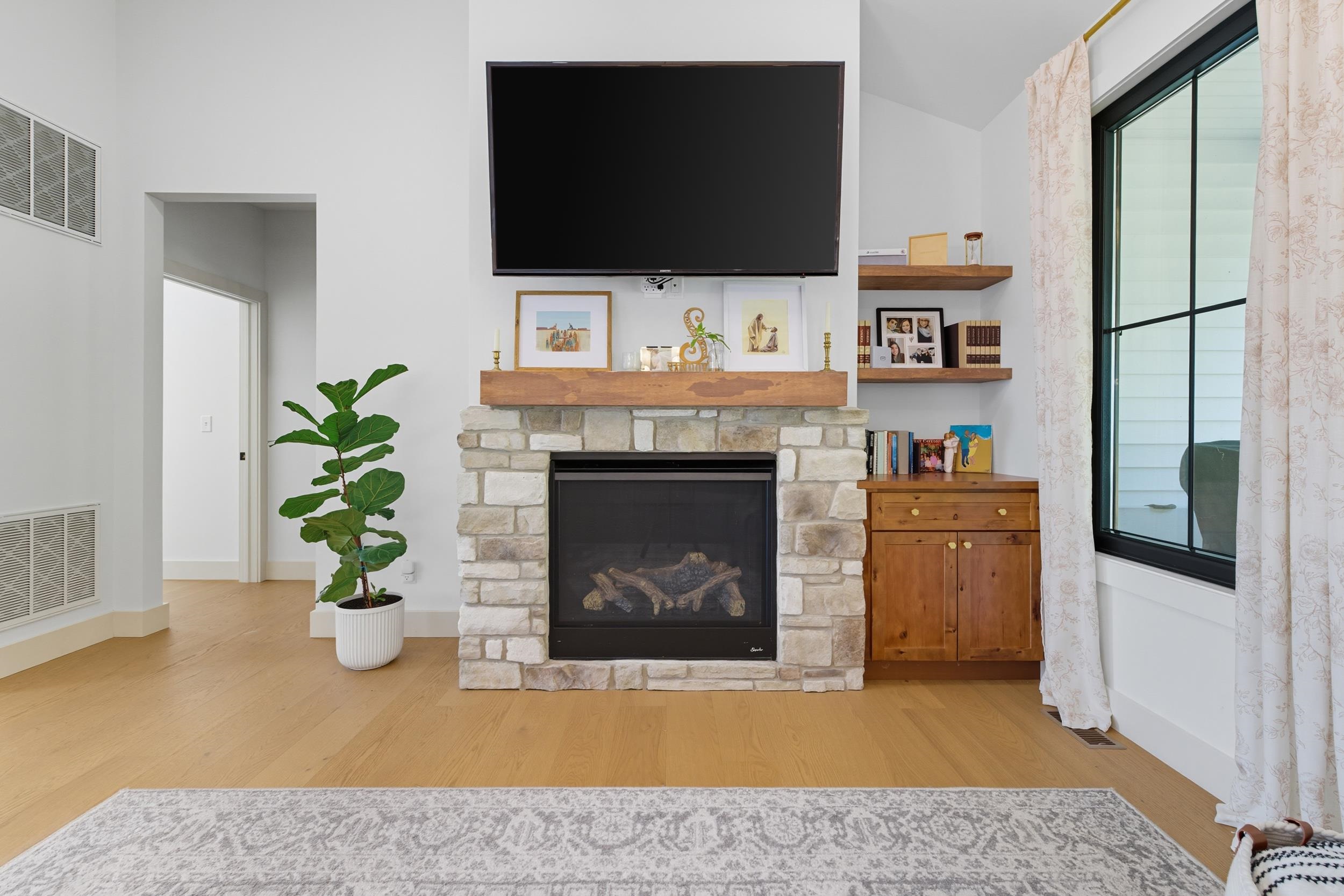2430 Fadley Road Bridgewater, VA 22812 - Photo 27 of 66 a living room with furniture and a fireplace
