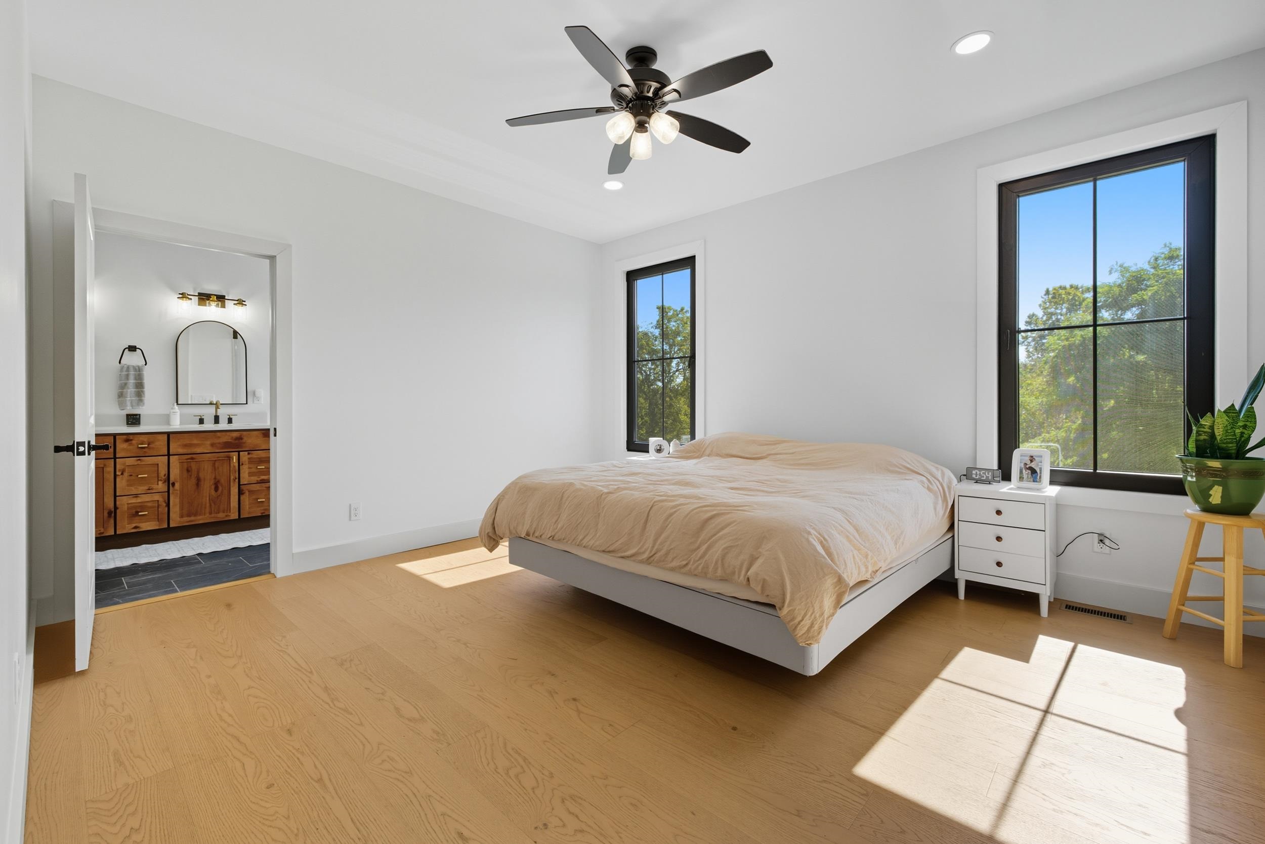 2430 Fadley Road Bridgewater, VA 22812 - Photo 3 of 66 a spacious bedroom with a bed and a chandelier
