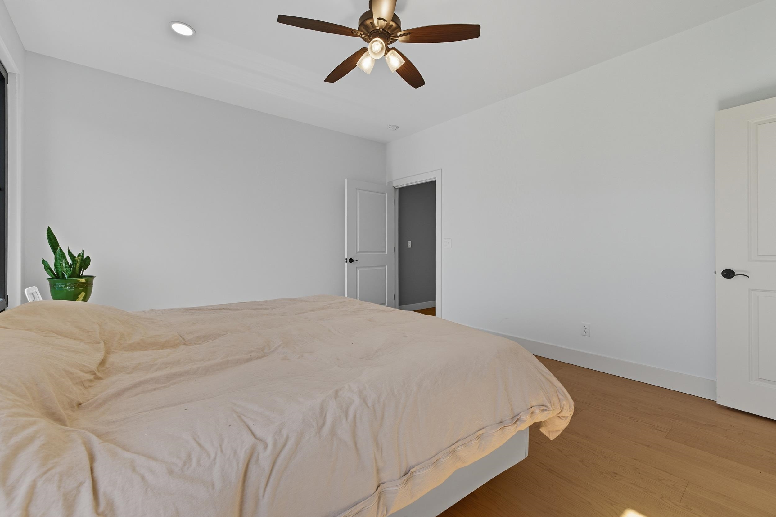 2430 Fadley Road Bridgewater, VA 22812 - Photo 32 of 66 a bedroom with a bed and a ceiling fan