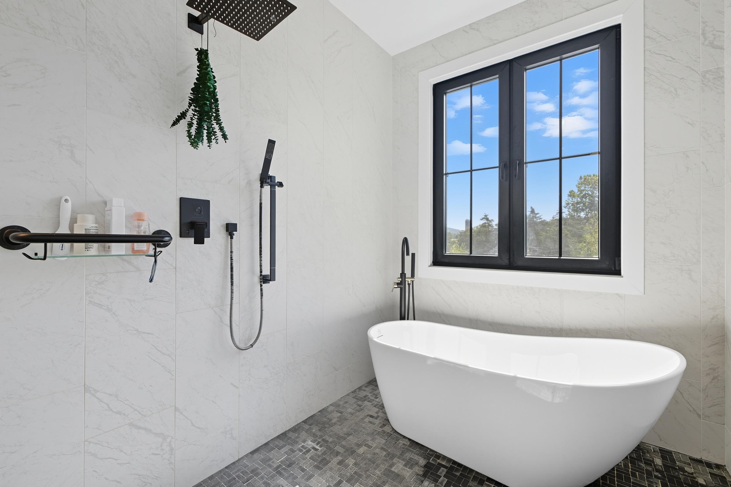 2430 Fadley Road Bridgewater, VA 22812 - Photo 38 of 66 a white bath tub sitting next to a window