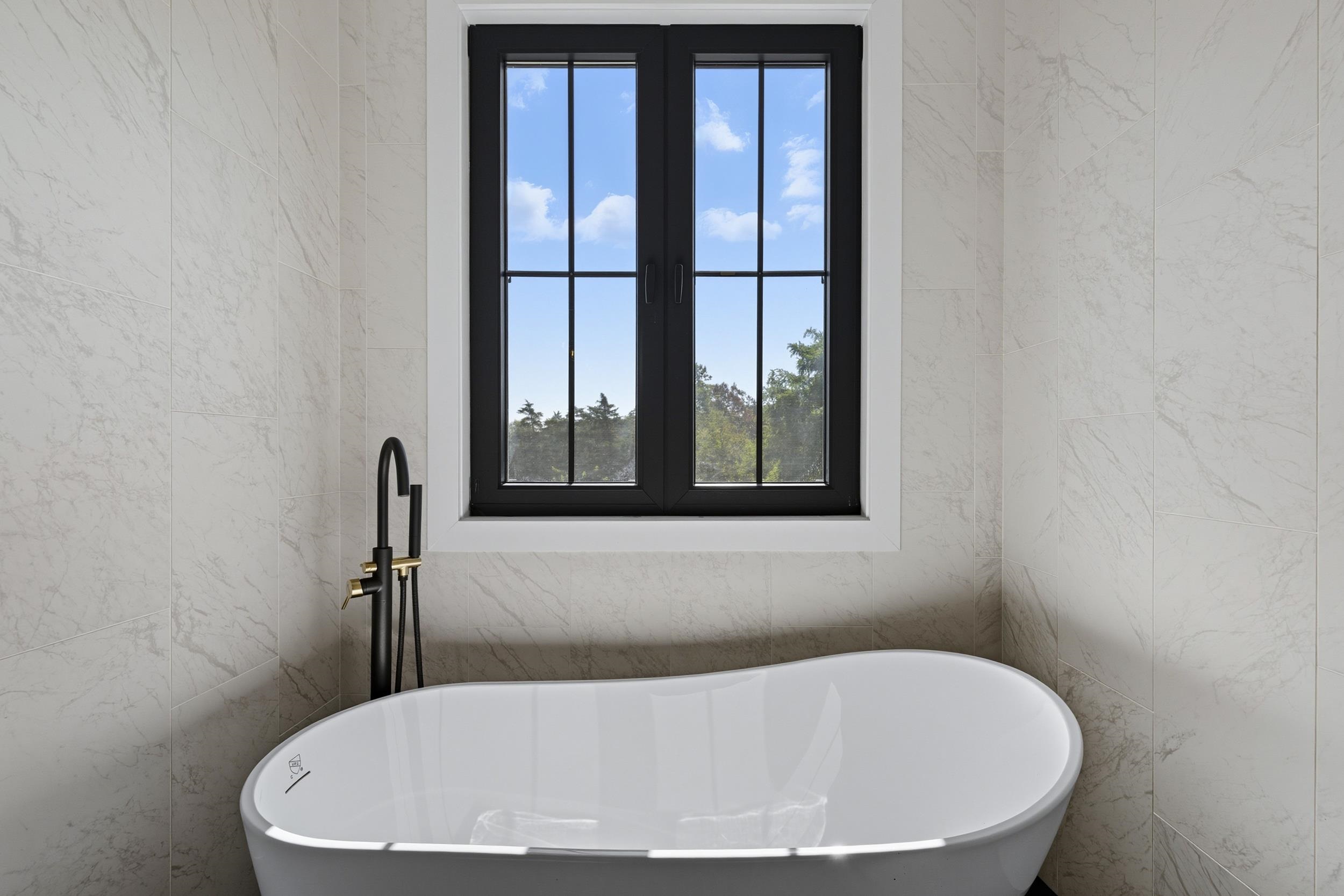 2430 Fadley Road Bridgewater, VA 22812 - Photo 39 of 66 a white bath tub sitting in a bathroom