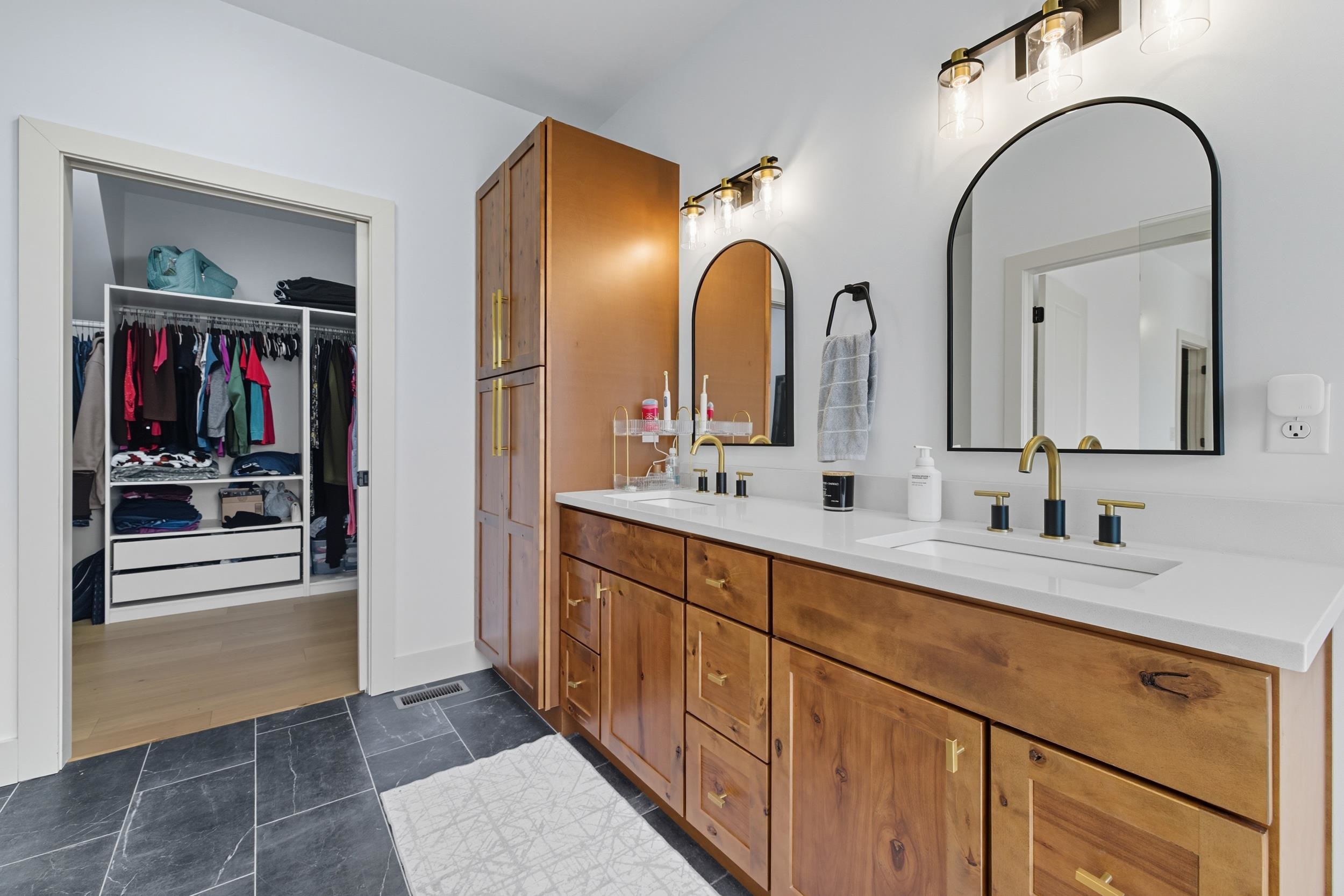 2430 Fadley Road Bridgewater, VA 22812 - Photo 40 of 66 a bathroom with a double vanity sink and a mirror