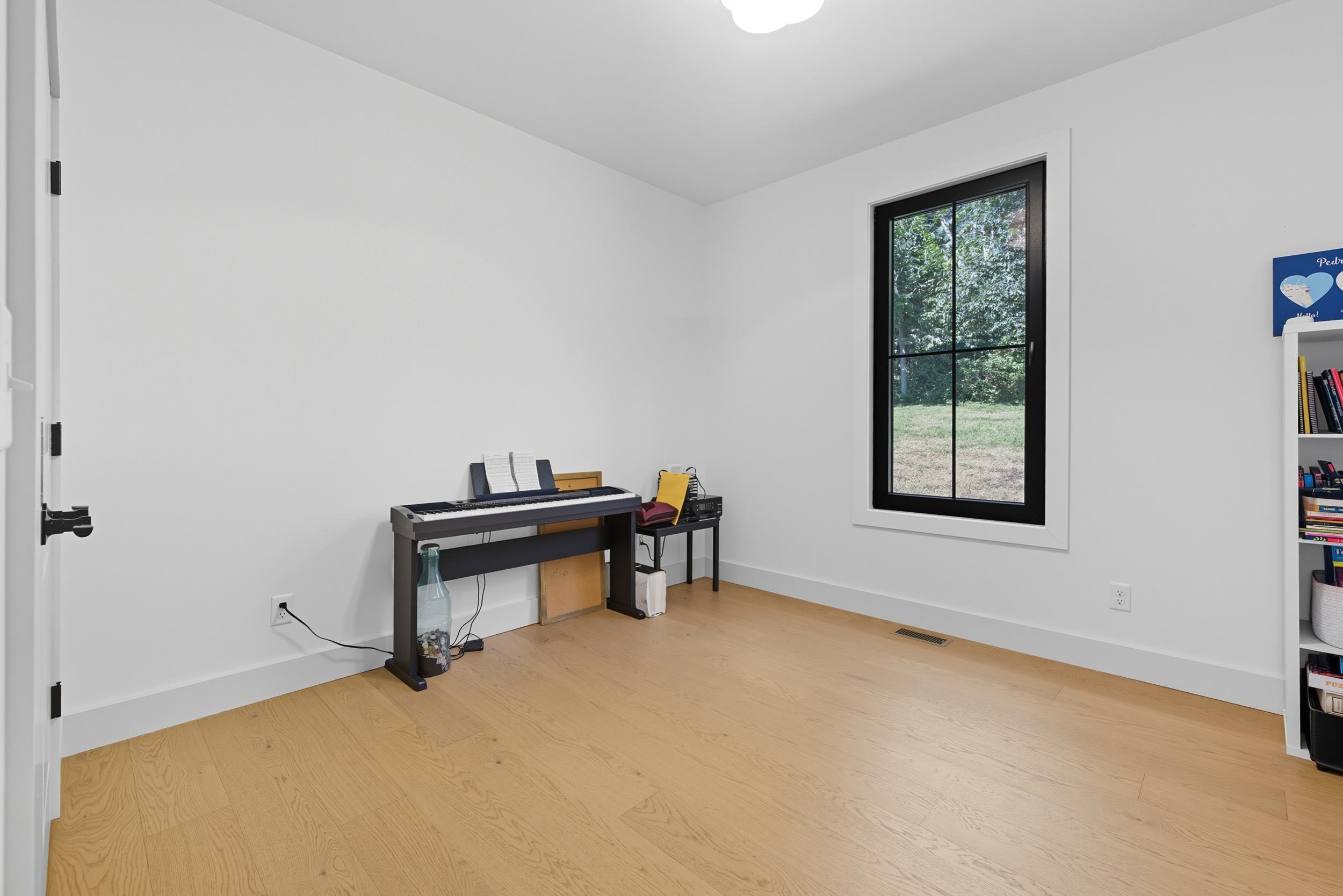 2430 Fadley Road Bridgewater, VA 22812 - Photo 46 of 66 an empty room with windows and furniture