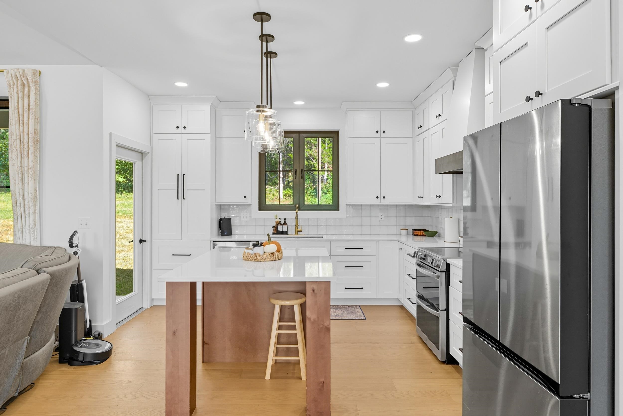 2430 Fadley Road Bridgewater, VA 22812 - Photo 7 of 66 a kitchen with stainless steel appliances a refrigerator sink and cabinets