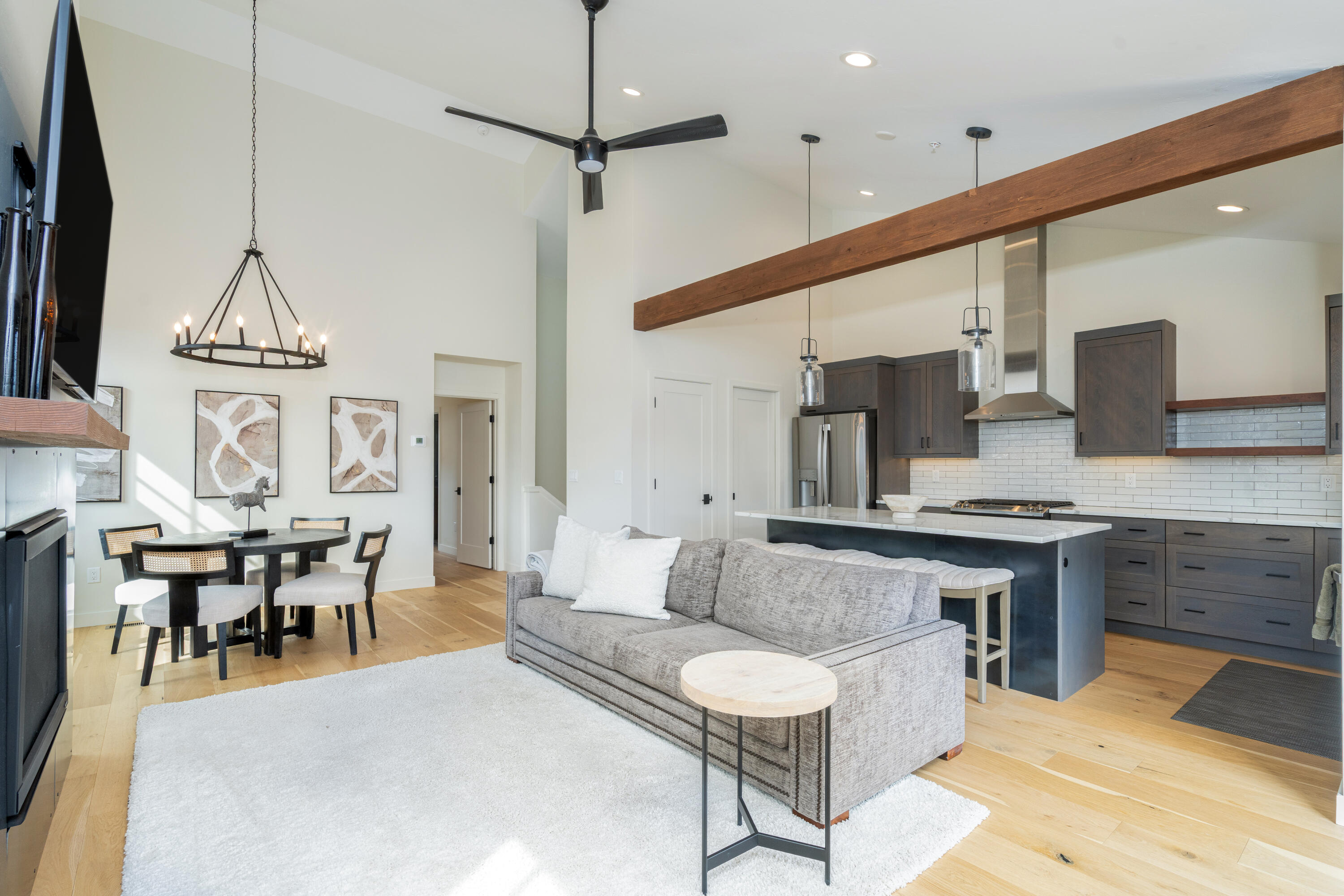 388 North Lena Street, Unit 5C Ridgway, CO 81432 - Photo 1 of 27 a living room with stainless steel appliances kitchen island a table and chairs