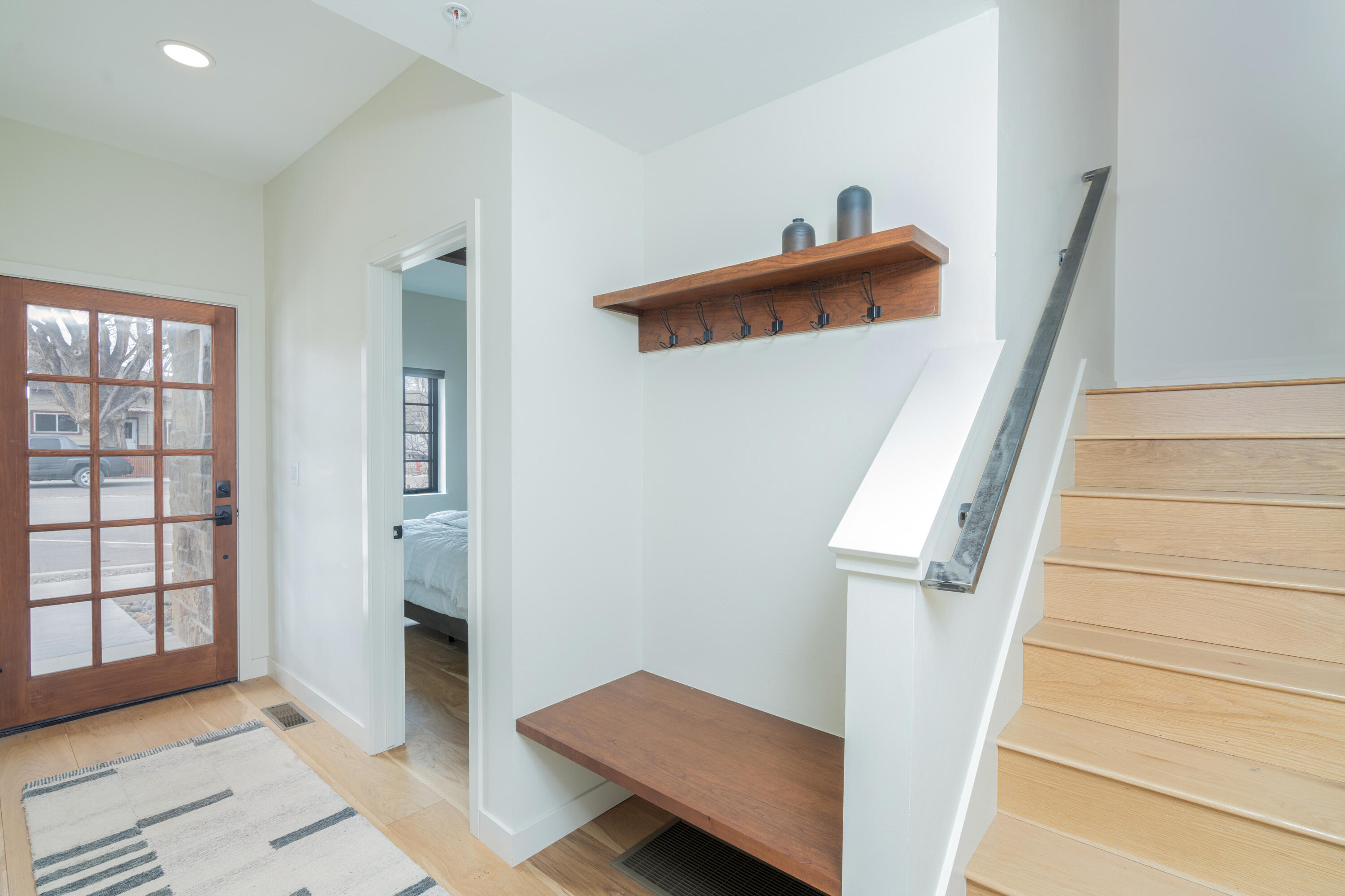 388 North Lena Street, Unit 5C Ridgway, CO 81432 - Photo 15 of 27 a view of entryway with stairs and wooden floor