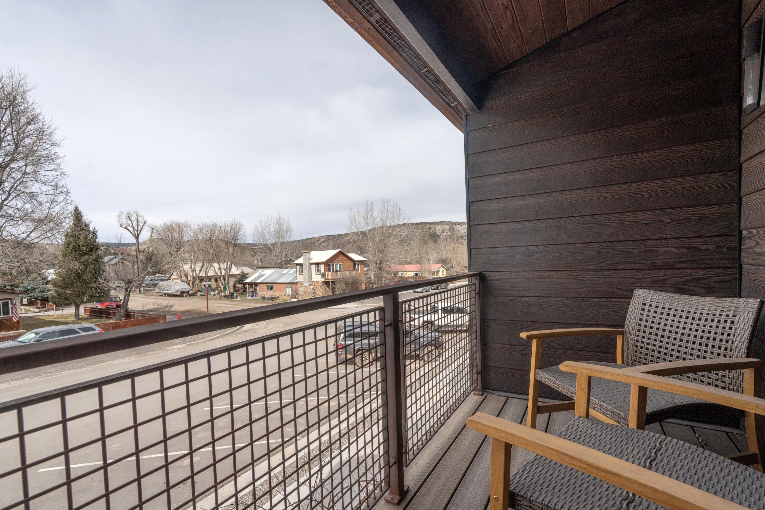 388 North Lena Street, Unit 5C Ridgway, CO 81432 - Photo 20 of 27 a view of roof deck with wooden floor and fence