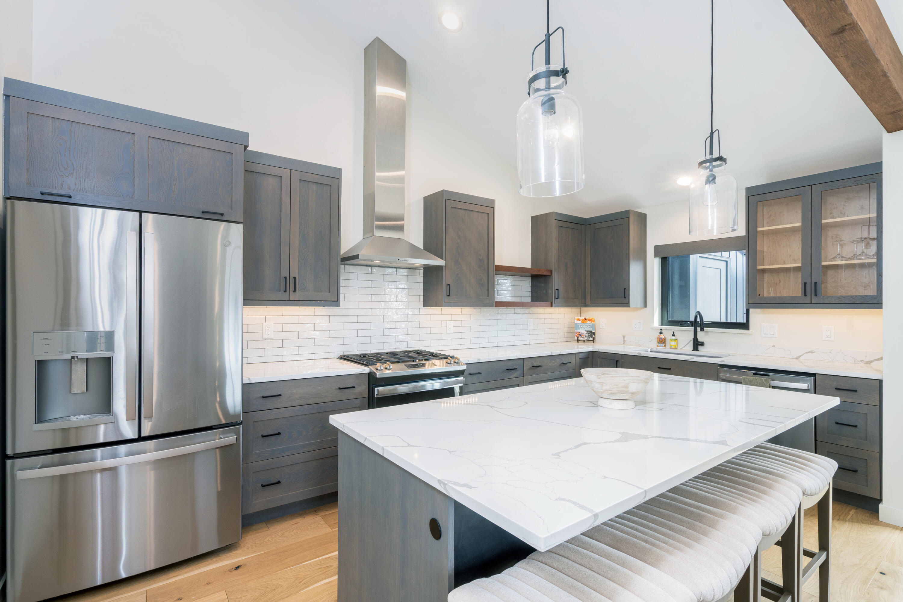 388 North Lena Street, Unit 5C Ridgway, CO 81432 - Photo 2 of 27 a kitchen with stainless steel appliances granite countertop a sink a stove and a refrigerator