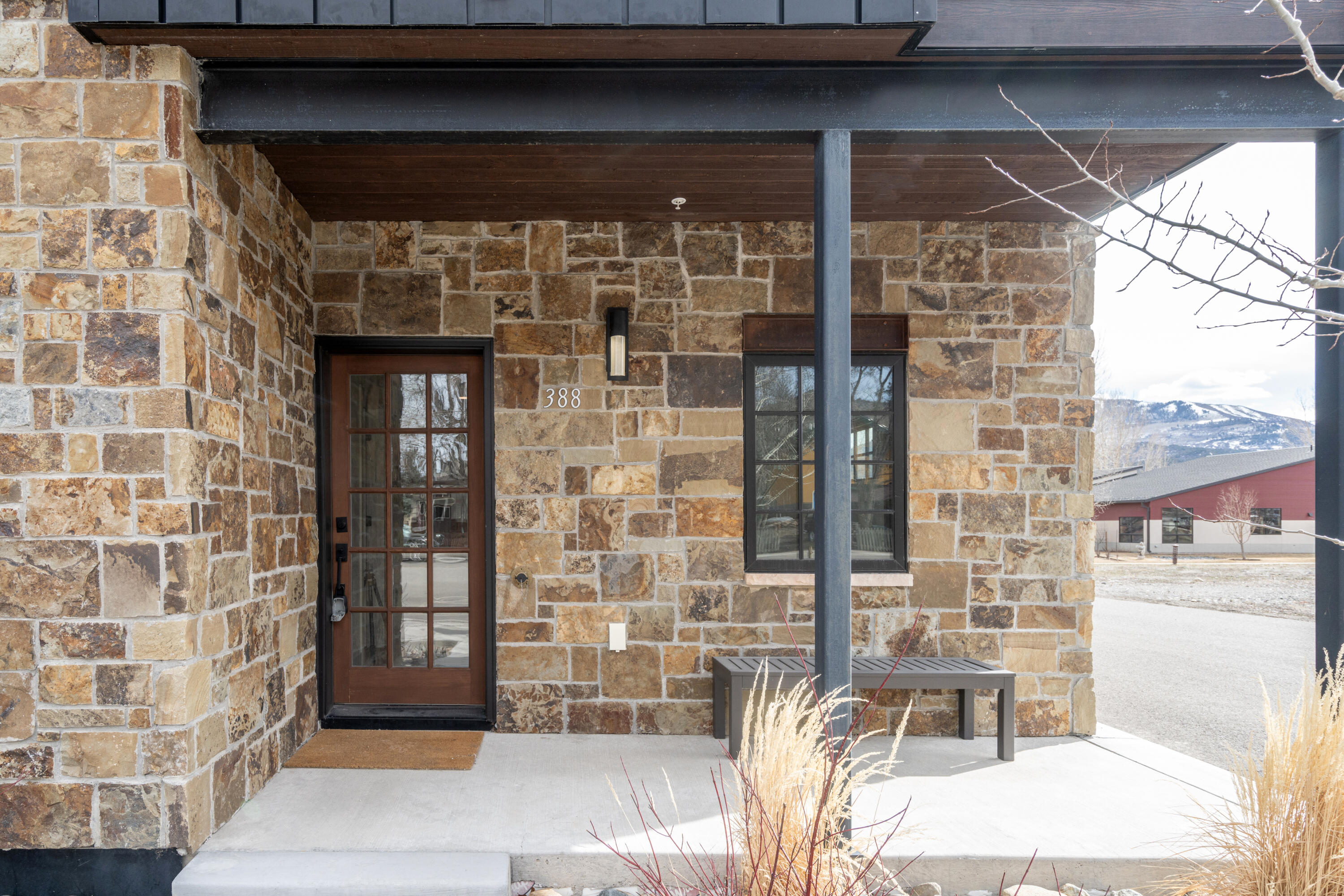 388 North Lena Street, Unit 5C Ridgway, CO 81432 - Photo 22 of 27 a front view of a building with a glass door
