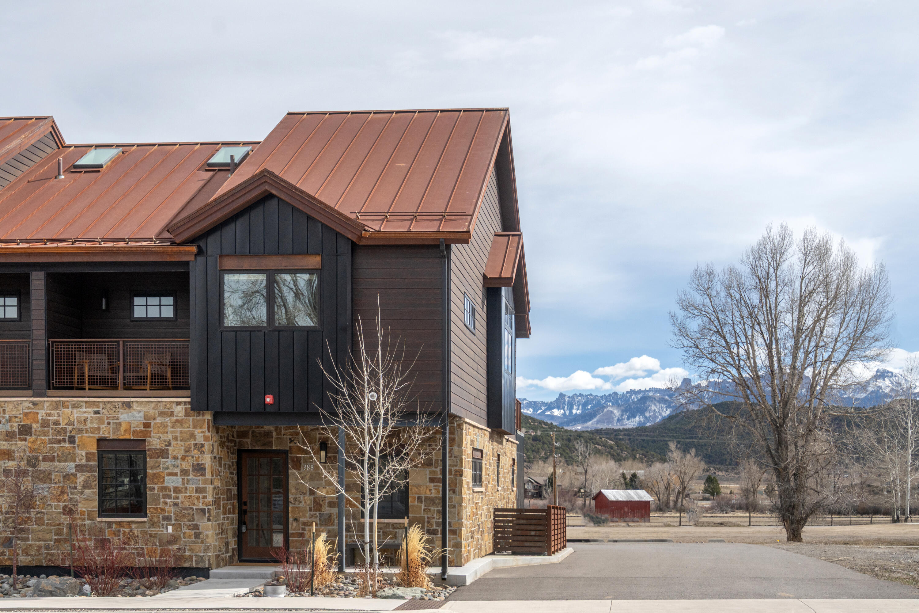 388 North Lena Street, Unit 5C Ridgway, CO 81432 - Photo 23 of 27 a tall building sitting on the side of a street