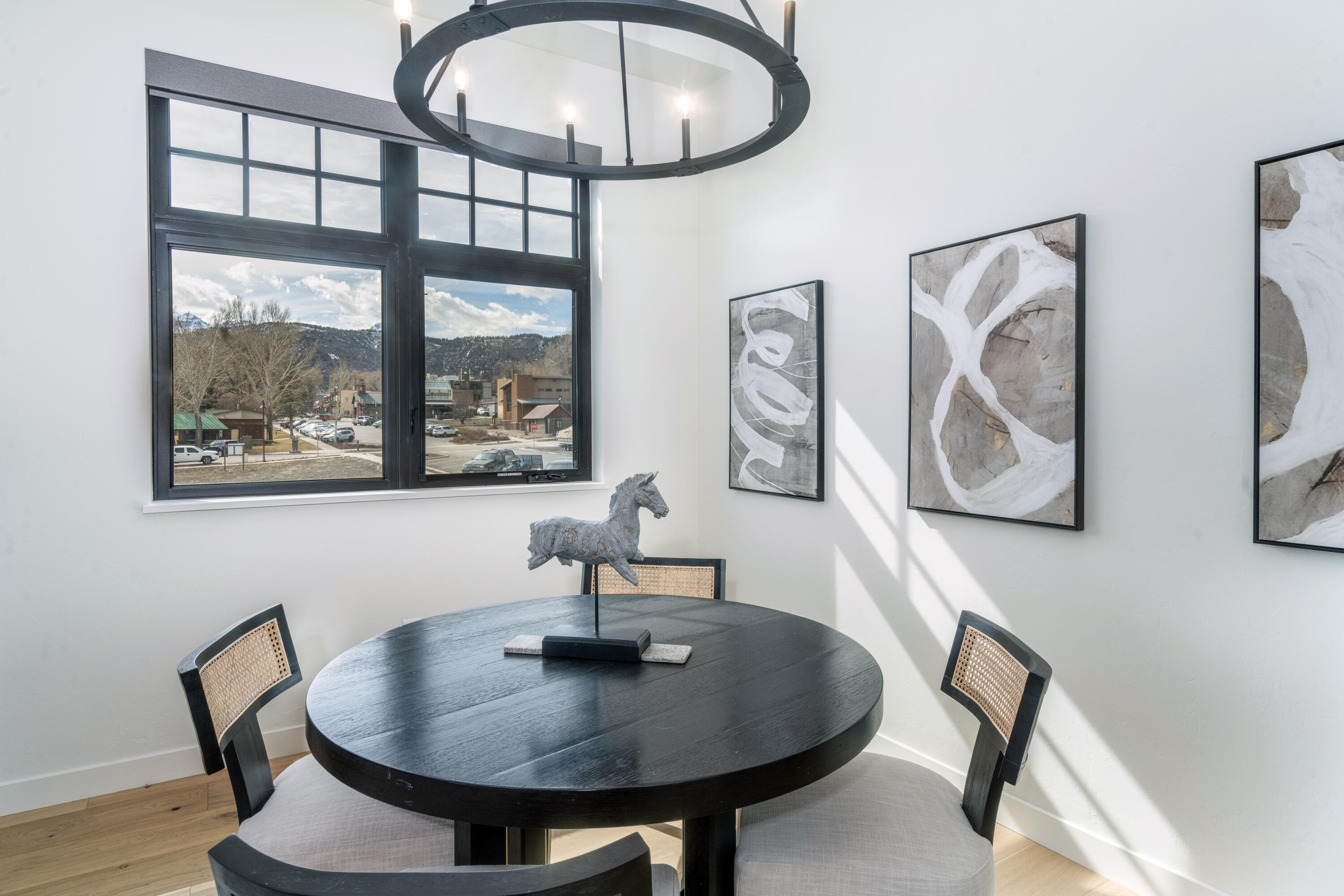 388 North Lena Street, Unit 5C Ridgway, CO 81432 - Photo 6 of 27 a view of dining room and hall with wooden floor