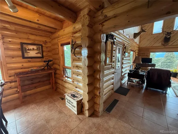 a kitchen with a stove sink and cabinets