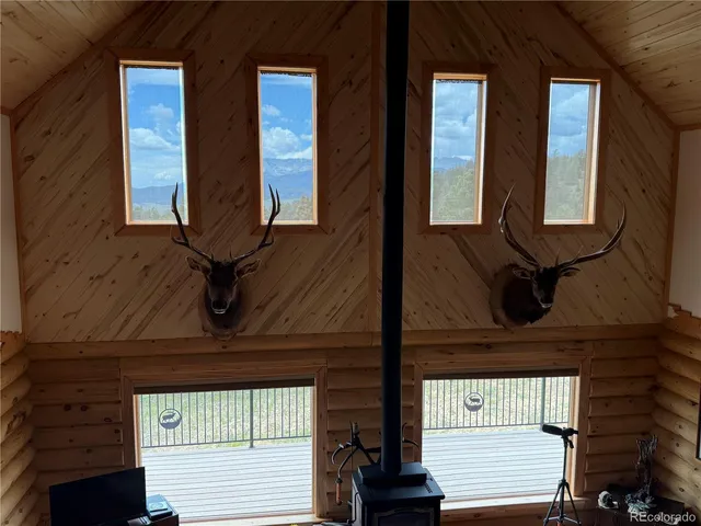 a bedroom with a bed and a mirror