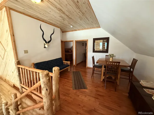 a bedroom with a bed and a desk